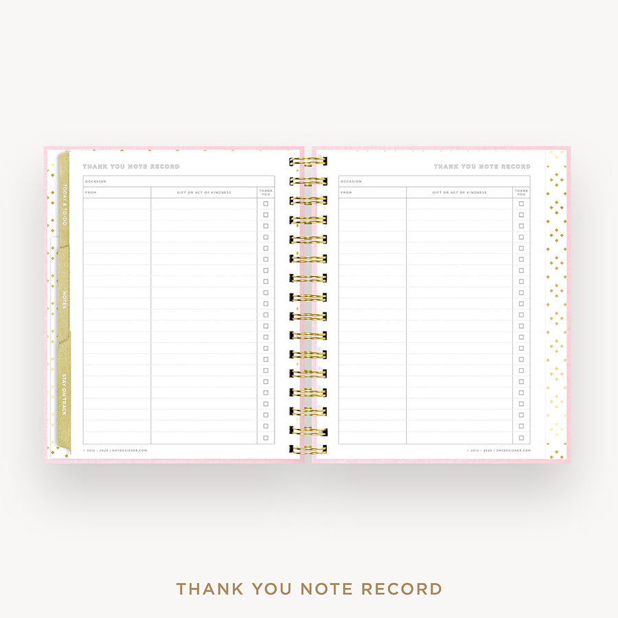 An open spiral-bound thank you note record planner page set, shown on a light gray background with the title 'THANK YOU NOTE RECORD' below. The pages are white with light pink borders, gold polka dots, and gold-and-white rings.