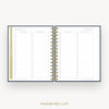 An open spiral-bound planner or notebook showing two lined pages titled 'FAVORITES LIST' with checkboxes, photographed on a light gray background with the text 'FAVORITES LIST' below.