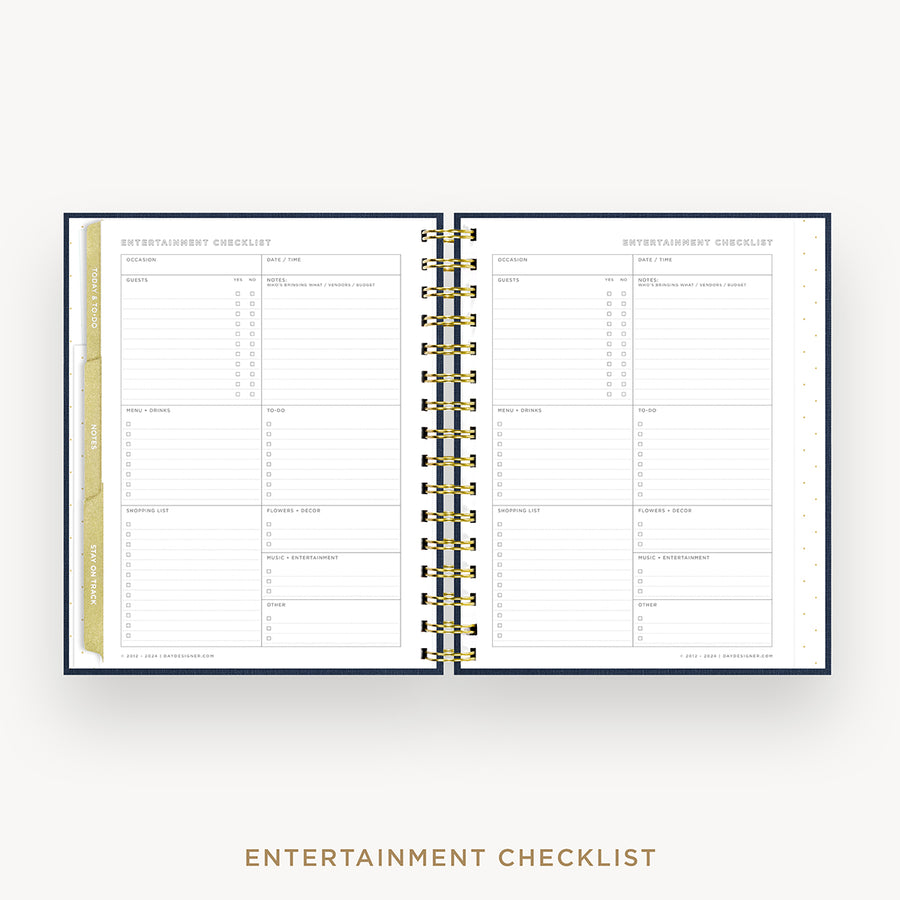 An open spiral-bound checklist planner showing two inner pages titled 'ENTERTAINMENT CHECKLIST' with lined sections and tabs, photographed on a light gray background with the text 'ENTERTAINMENT CHECKLIST' below.