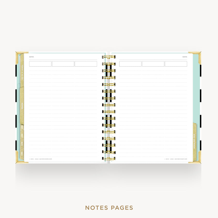An open spiral-bound planner or notebook showing lined notes pages, with gold and black spiral binding and pale mint page edges, on a light gray background. The text 'NOTES PAGES' appears below.