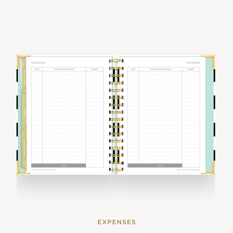 An open spiral-bound planner showing the Expenses page with lined sections for income, expenses, debts, and savings, set against a light gray background with the word 'EXPENSES' below.