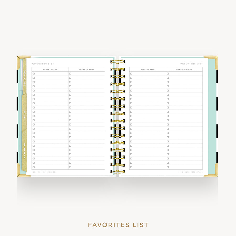 An open spiral-bound planner or notebook showing the 'Favorites List' interior page layout. The pages are white with light blue-gray columns and checkboxes, bound with metallic gold rings, and photographed on a light gray background with the text 'FAVORITES LIST' below.