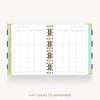 An open spiral-bound planner or notebook showing two white pages with grid tables and the heading 'GIFT IDEAS TO REMEMBER.' The cover edges are pale mint green and gold, with black side tabs.