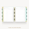 An open spiral-bound thank you note record planner on a light gray background. The pages are white with gold lines and columns, and the cover edges show pastel green, gold, and black accents.