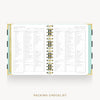 An open spiral-bound planner or notebook showing a packing checklist page spread across both pages, with gold rings and a mint and beige cover design, on a light gray background with the text 'PACKING CHECKLIST' below.