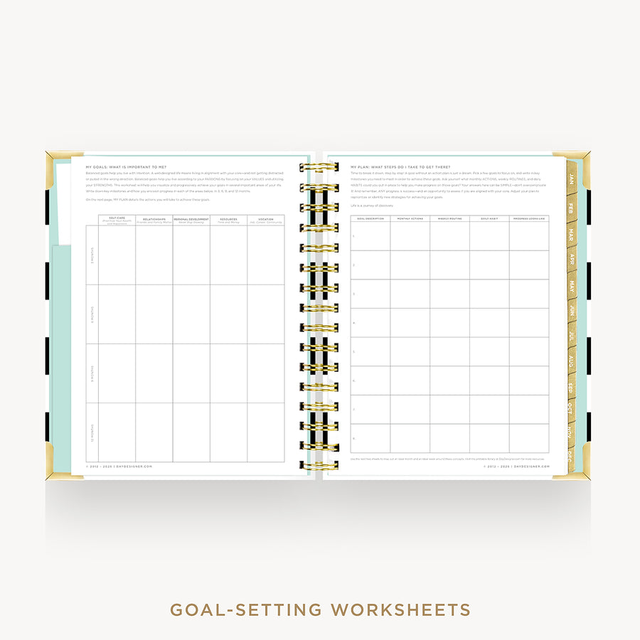 An open spiral-bound planner or notebook showing two white goal-setting worksheet pages with grid tables, gold ring binding, and a light aqua page tab on the left. The text 'GOAL-SETTING WORKSHEETS' appears below on a light gray background.