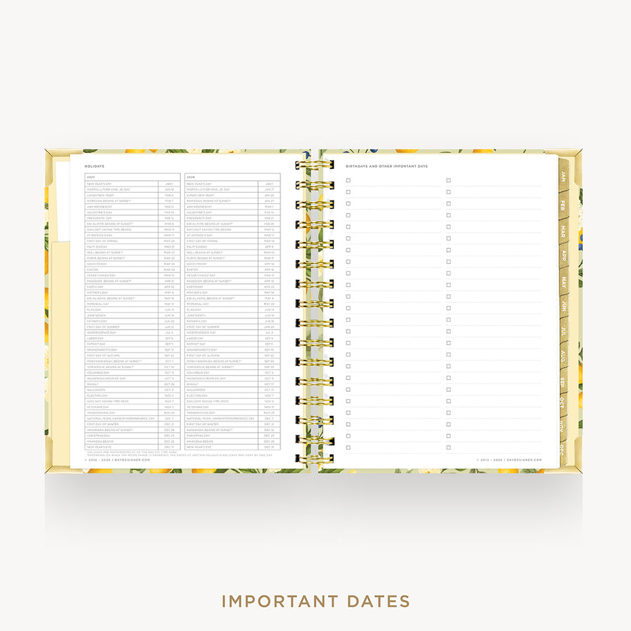 An open spiral-bound planner or agenda with floral-patterned gold and yellow covers, showing printed tables and lined pages on a light gray background. The text 'IMPORTANT DATES' appears below.
