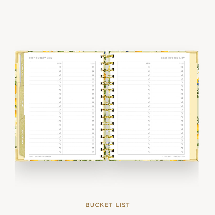 An open spiral-bound planner or budget tracker with lined pages titled 'BEST BUCKET LIST' and a floral gold border, shown on a light gray background with the words 'BUCKET LIST' below.