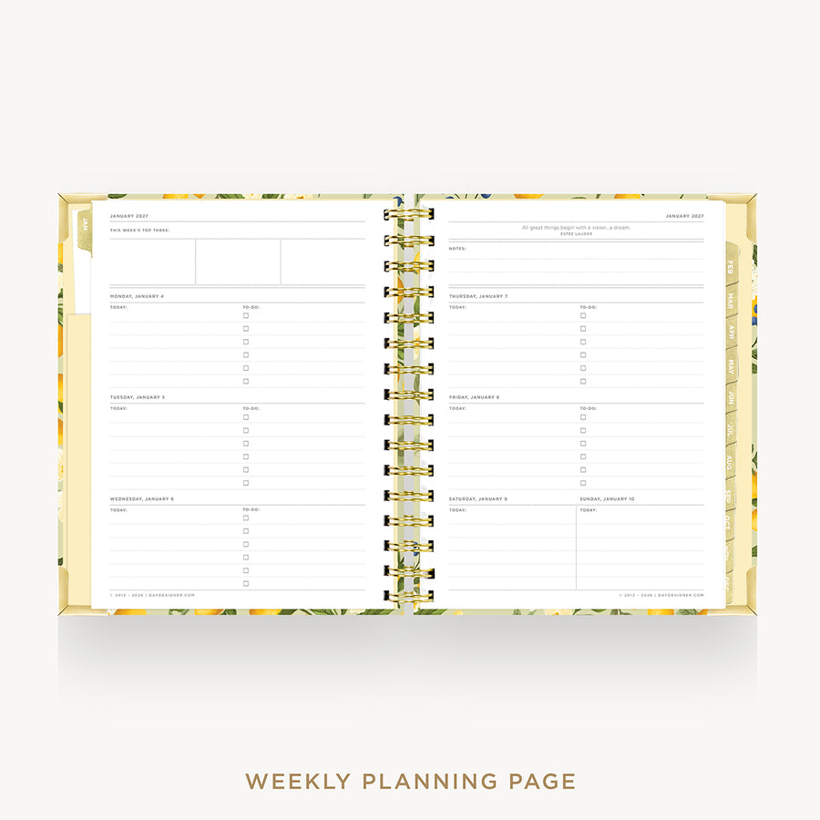 An open spiral-bound planner showing weekly planning pages with floral-patterned gold and yellow borders, photographed on a light gray background with the text 'WEEKLY PLANNING PAGE' below.