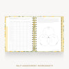 An open spiral-bound workbook showing self-assessment worksheet pages, with a floral-patterned cover and gold-toned spiral binding, centered on a light gray background with the text 'SELF-ASSESSMENT WORKSHEETS' below.