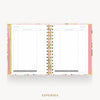 An open spiral-bound planner or notebook showing the expenses page with lined columns, floral-patterned pink and gold covers, and the word EXPENSES printed below on a light gray background.