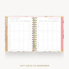 An open spiral-bound planner or notebook with floral-patterned pink and gold covers, showing two printed tables titled 'GIFT IDEAS TO REMEMBER' on the inner pages, set against a light gray background with matching text below.