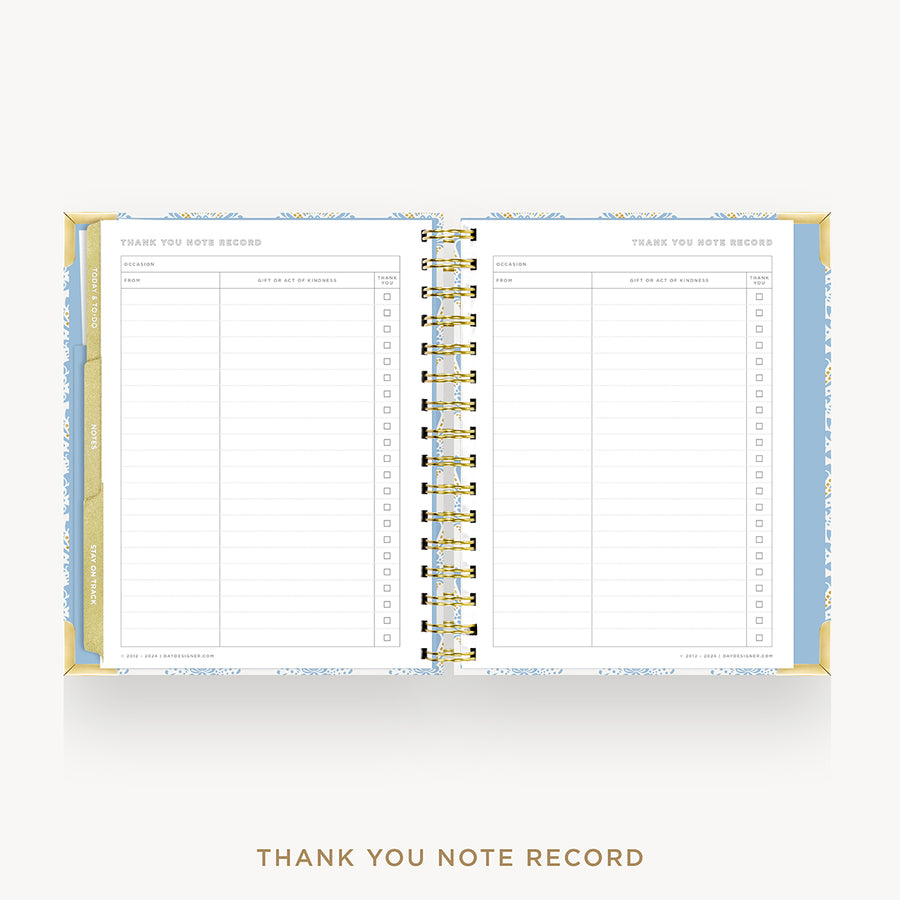 An open spiral-bound thank you note record book with lined pages, shown on a light gray background with the text 'THANK YOU NOTE RECORD' below.