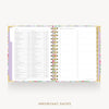 An open spiral-bound planner or agenda with floral-patterned covers and white pages, shown on a light gray background with the words 'IMPORTANT DATES' below.