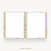 An open spiral-bound planner or notebook showing lined notes pages, with a pastel floral patterned cover and gold-toned binding, on a light gray background. The text 'NOTES PAGES' appears below.
