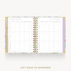An open spiral-bound gift planner or memo book with floral-patterned covers and white pages titled 'GIFT IDEAS TO REMEMBER,' shown on a light gray background with matching text below.