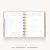 An open spiral-bound workbook showing self-assessment worksheets with tables and a Venn diagram on white pages, framed by a pastel floral border and gold-toned binding, on a light gray background with the text 'SELF-ASSESSMENT WORKSHEETS' below.