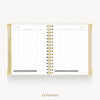 An open spiral-bound planner or notebook showing two blank expense pages with gold rings and a gold cover edge, centered on a light gray background with the word EXPENSES below.