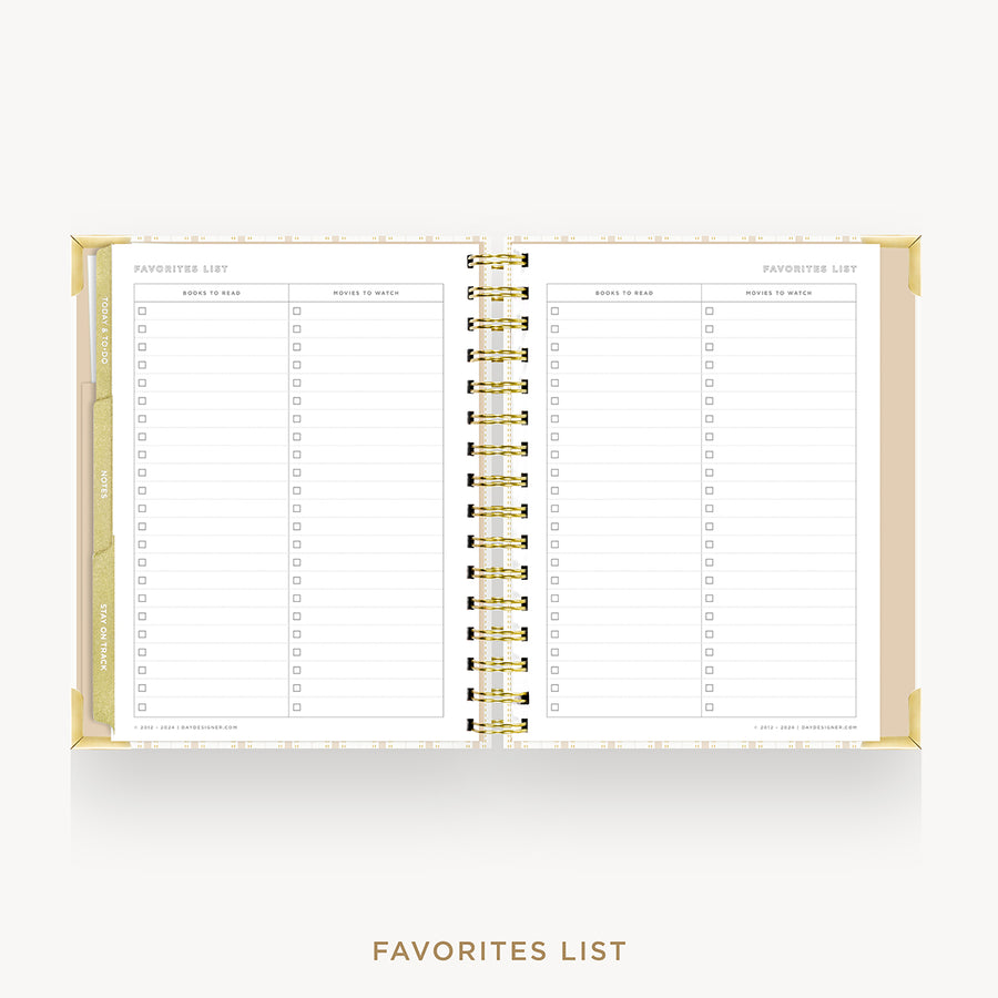 An open spiral-bound planner or notebook showing a favorites list page layout with lined sections and checkboxes, photographed on a light gray background with the words 'FAVORITES LIST' below.
