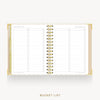 An open spiral-bound planner or notebook showing a 'Bucket List' page layout with lined sections and checkboxes, photographed on a clean white background with the words 'BUCKET LIST' below.