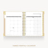 An open monthly calendar planner with gold spiral binding, showing January 2027 on the right page and tabbed monthly pages on the left. The cover is a warm beige with gold trim, set against a light gray background with the text 'TABBED MONTHLY CALENDAR' below.