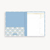 Open book clipfolio with blue shell design on a white background