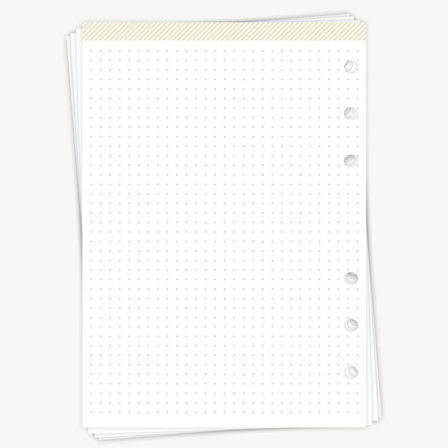 White notebook with grid pattern on a white background