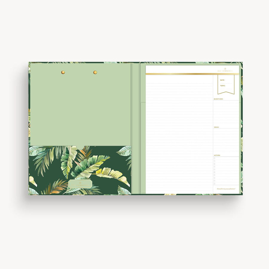 green and gold palm leaves clipfolio with light green interior pocket and lined pad on a cream background