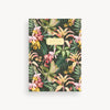 Notebook with tropical floral design on a white background