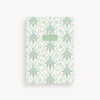 Notebook with palm tree pattern on a white background