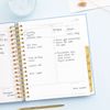 Day Designer 2024-25 daily planner: Chambray Bookcloth opened with writing on it