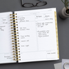 Day Designer 2024 daily planner: Charcoal Bookcloth  opened with writing on it