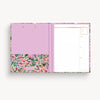 red, purple, pink, green floral pattern clipfolio with lilac interior pocket and lined pad on a cream background