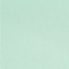 A close-up image of a sage green linen-look fabric cover of a daily planner.