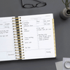 Day Designer 2024 mini daily planner: Charcoal Bookcloth opened with writing on it