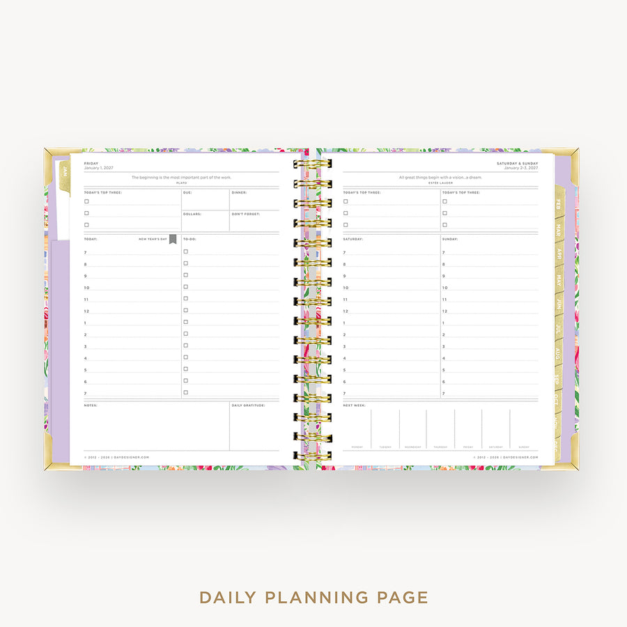 An open spiral-bound daily planner showing two lined daily planning pages with floral-patterned covers and gold rings, centered on a light gray background with the text 'DAILY PLANNING PAGE' below.