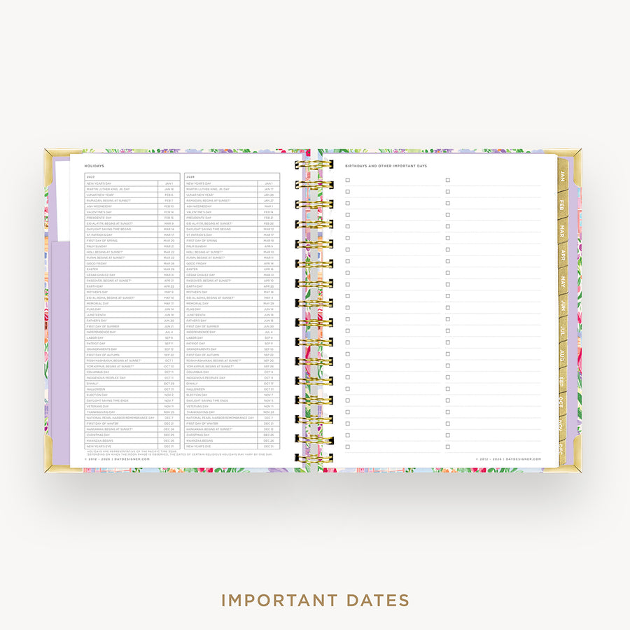 An open spiral-bound planner or agenda with floral-patterned covers and white pages, showing a detailed monthly calendar spread and a checklist page. The brand name 'Society6' is visible in the bottom right corner of the page.