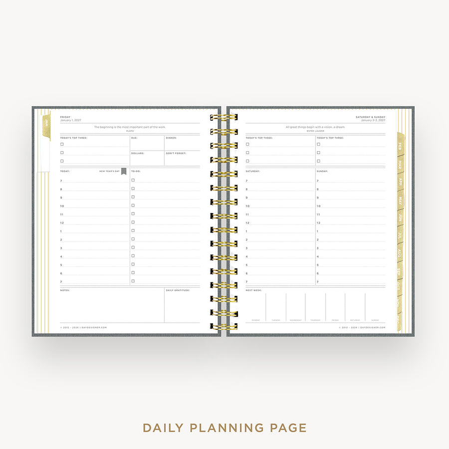 An open spiral-bound planner showing two daily planning pages with gold rings and gold accent lines, photographed on a light gray background with the text 'DAILY PLANNING PAGE' below.