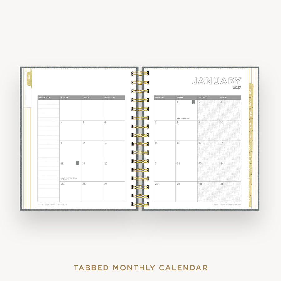 An open tabbed monthly calendar planner shown from the front, with gold spiral binding and a white page layout featuring a January 2027 calendar spread. The text 'TABBED MONTHLY CALENDAR' appears below on a light neutral background.