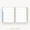 An open spiral-bound planner showing a 12-month overview calendar spread on a light gray background, with the text '12-MONTH OVERVIEW' below.