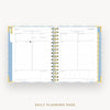An open spiral-bound daily planner page with lined layout sections, shown on a light gray background with the text 'DAILY PLANNING PAGE' below.