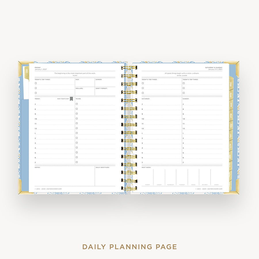 An open spiral-bound daily planner page with lined layout sections, shown on a light gray background with the text 'DAILY PLANNING PAGE' below.