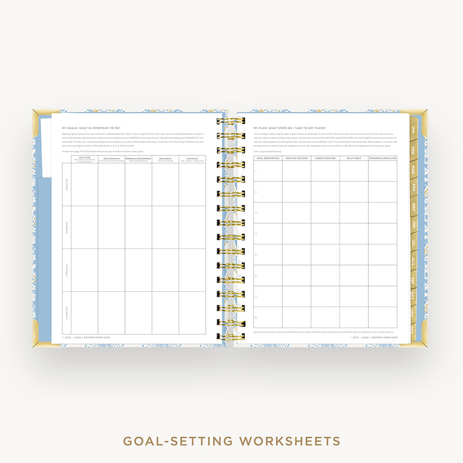 An open spiral-bound planner or notebook showing two printed goal-setting worksheet pages with tables and text, set against a light gray background with the words 'GOAL-SETTING WORKSHEETS' below.