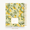 Planner with pattern of lemons, leaves, and flowers on a light green background, Day Designer logo on bottom gold trimmed box, with BACK COVER shown on the bottom
