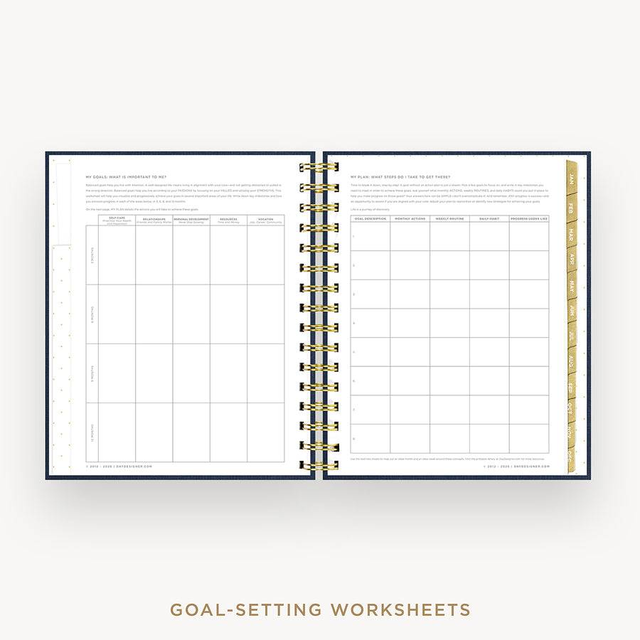 An open spiral-bound planner or workbook showing two printed goal-setting worksheet pages, with gold and black spiral binding and a gold vertical page marker. The pages are centered on a light gray background, with the text 'GOAL-SETTING WORKSHEETS' below.