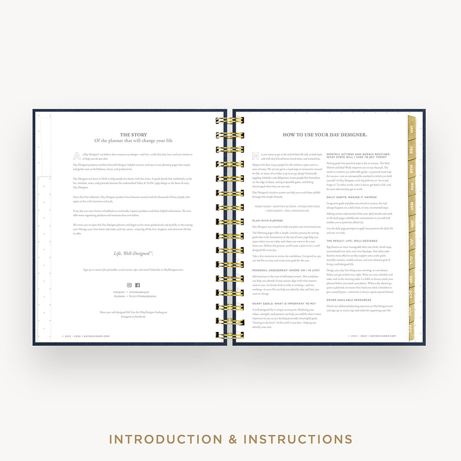 An open spiral-bound booklet or planner showing printed introduction and instructions pages, with gold ring binding and gold page tabs, centered on a light gray background. Text below reads 'INTRODUCTION & INSTRUCTIONS'.