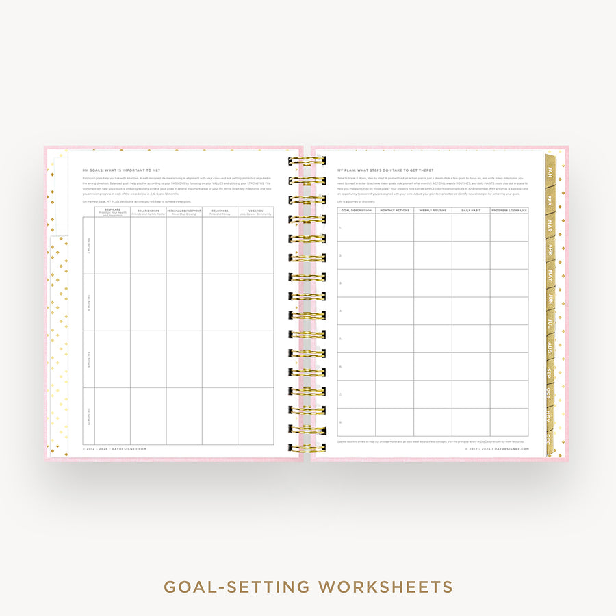 An open spiral-bound planner or notebook showing two printed goal-setting worksheet pages with gold rings and a gold pencil, on a light gray background with the text 'GOAL-SETTING WORKSHEETS' below.