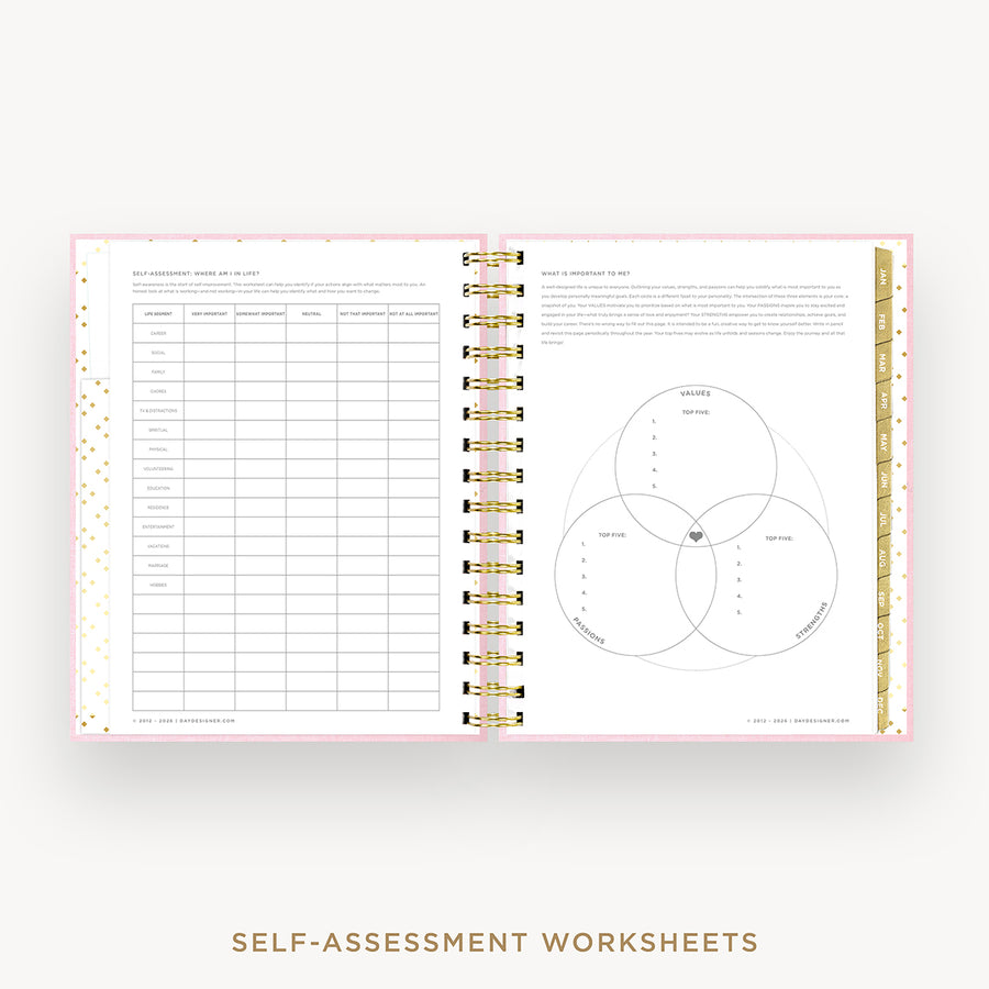 An open spiral-bound workbook showing self-assessment worksheets, including a checklist page on the left and a Venn diagram page on the right, with gold rings and a gold ruler on a white page. Text below reads 'SELF-ASSESSMENT WORKSHEETS'.