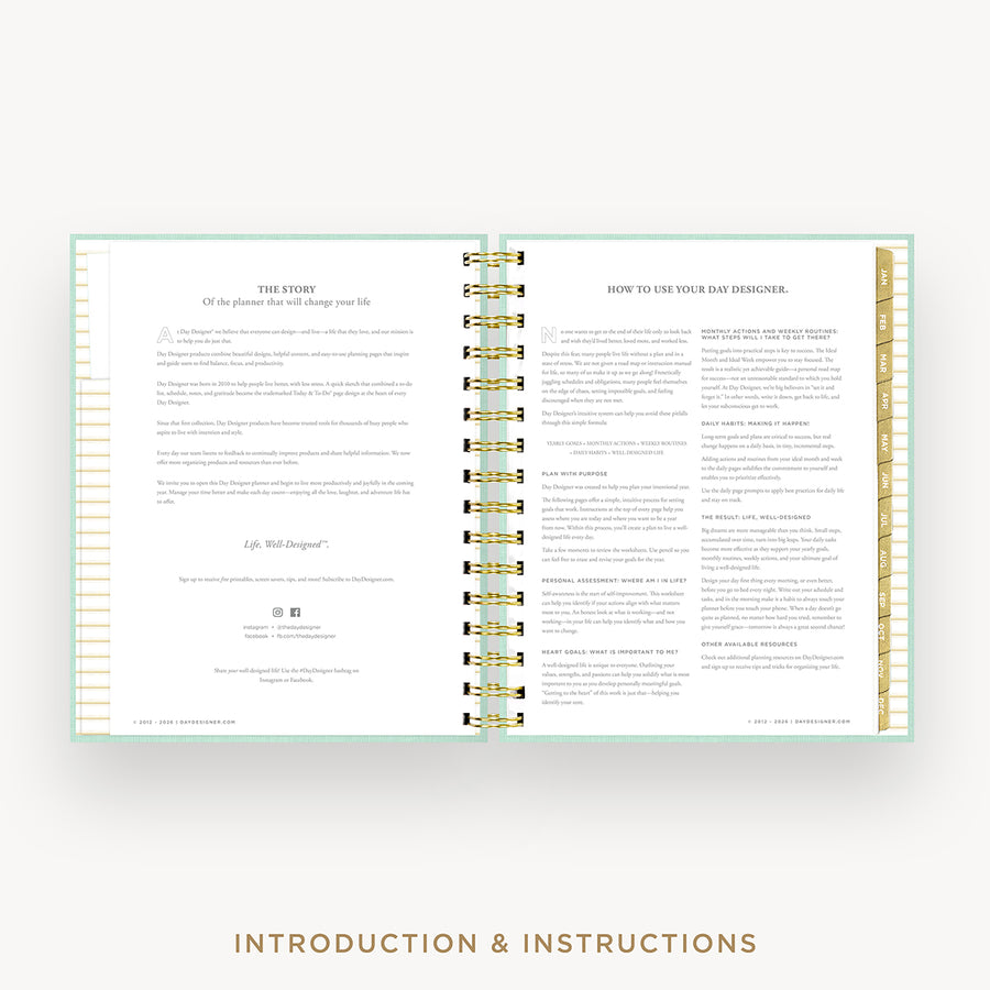 An open spiral-bound journal or planner showing printed introduction and instructions pages, with gold ring binding and a pale mint cover edge, centered on a light gray background. Text below reads 'INTRODUCTION & INSTRUCTIONS'.