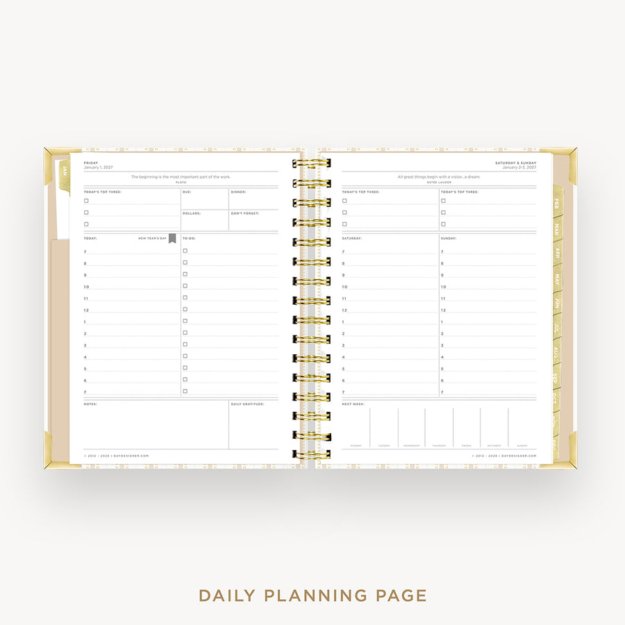 An open daily planning page in a gold spiral-bound planner, shown on a light gray background with the text 'DAILY PLANNING PAGE' below.